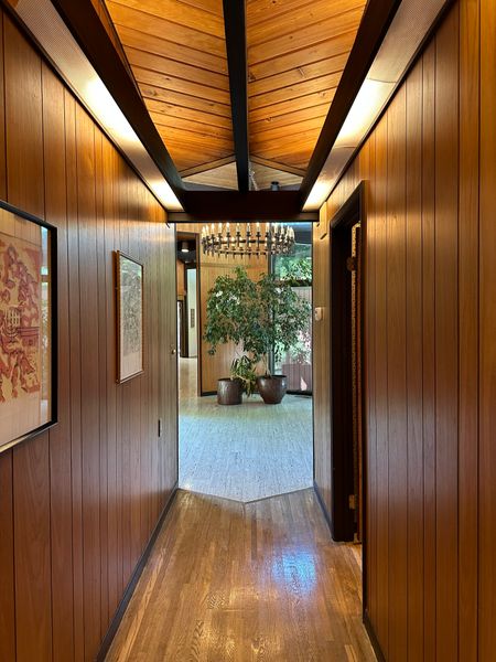 Before: The original ceilings and travertine floors were kept in the entry.