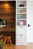 A full wall of built-in storage cabinets accented with walnut and oil-rubbed bronze hardware. Photo 4 of Chenery Street Remodel modern home