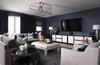 Quiet, spacious media room with deep hues to set the mood. Photo 4 of Austin Urban Townhome modern home