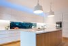 Kitchen with Green wall splashback Photo 8 of Castlecrag House modern home