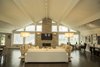 The living space transformed into a light airy and voluminous area for entertaining. Photo of The R.D. House modern home