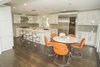 The kitchen which flow right from the Living Room. Updated to a new white sleek look. Photo 4 of The R.D. House modern home