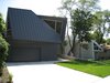 looking SW.:1216 main (new house) is on the left, 1220 main (previous house) is on the right Photo 2 of metalHOUSE(2) modern home