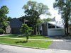 looking SE: 1216 main (new house) is on the left, 1220 main (previous house) is on the right Photo of metalHOUSE(2) modern home