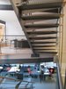 looking W into lower level studio from stair landing: the same fabrication system used in julia’s bedroom is repeated. dining room beyond. Photo 18 of metalHOUSE(2) modern home