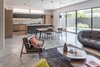 Modern home with Living Room, Concrete Floor, Sofa, Pendant Lighting, Chair, and Coffee Tables. Living Room Photo 4 of Wharton Residence