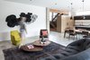 Modern home with Living Room, Rug Floor, Concrete Floor, Sofa, Chair, Coffee Tables, and Pendant Lighting. Living Room Photo 6 of Wharton Residence