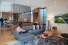 Modern home with Living Room, Sofa, Chair, Sectional, and Light Hardwood Floor. Interior View Photo 5 of McClendon Residence