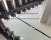 Modern home with Interior, Metal, Sliding Door Type, Metal Tread, Metal Railing, Wood Tread, Glass Railing, and Staircase. Stair Detail Photo 11 of Noho Duplex, New York