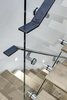 Modern home with Metal, Interior, Sliding Door Type, Staircase, Wood Tread, Metal Tread, Glass Railing, and Metal Railing. Stair Detail Photo 12 of Noho Duplex, New York