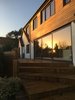 Rear with sunrise Photo 16 of FOlly Hill modern home