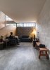 Modern home with Living Room, Console Tables, Bench, Ceiling Lighting, Concrete Floor, and Sofa. on ground floor, the living areas have privacy from the outside Photo 3 of Melón House