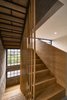 Modern home with Staircase, Wood Railing, and Wood Tread. wood elements creates a contrast between the concrete and steel Photo 6 of Melón House