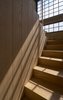 Modern home with Staircase, Wood Tread, and Wood Railing. neutral and sober tones create a peaceful atmosphere inside Photo 11 of Melón House