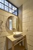 Modern home with Concrete Floor and Ceiling Lighting. bathroom Photo 13 of Melón House
