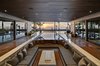 Modern home with Back Yard, Hardscapes, Walkways, Small Pools, Tubs, Shower, Concrete Pools, Tubs, Shower, Large Patio, Porch, Deck, Planters Patio, Porch, Deck, Decking Patio, Porch, Deck, Horizontal Fences, Wall, and Outdoor. Covered deck, sunken fire pit, and pool Photo 4 of Atlantic Beach Modern