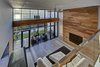 Modern home with Hardscapes, Horizontal Fences, Wall, Walkways, Large Patio, Porch, Deck, Planters Patio, Porch, Deck, Decking Patio, Porch, Deck, Grass, Shrubs, Trees, Front Yard, Boulders, and Living Room. living room from walkway Photo 8 of Atlantic Beach Modern