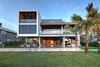 Modern home with Back Yard, Hardscapes, Walkways, Small Pools, Tubs, Shower, Concrete Pools, Tubs, Shower, Planters Patio, Porch, Deck, Decking Patio, Porch, Deck, Horizontal Fences, Wall, Swimming Pools, Tubs, Shower, Large Patio, Porch, Deck, and Outdoor. Ocean facing facade Photo of Atlantic Beach Modern