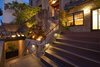 Modern home with Outdoor, Landscape Lighting, and Front Yard. The front of the house was not altered, other than the addition of mosa tiles to the stairs and landings. Photo 7 of Dolores Street