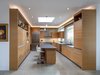 Modern home with Kitchen, Wood Cabinet, Concrete Floor, Dishwasher, Pendant Lighting, Undermount Sink, Range Hood, Glass Tile Backsplashe, Recessed Lighting, Range, Microwave, Granite Counter, and Refrigerator. Rift sawn white oak cabinets in the kitchen. Photo 8 of Oak Street