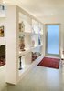 Modern home with Hallway and Concrete Floor. The entry display wall. Photo 10 of Oak Street