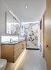 Modern home with Granite Counter, Undermount Sink, Concrete Floor, Accent Lighting, and Recessed Lighting. The master bathroom, with its awe-inspiring marble backdrop. Photo 17 of Oak Street