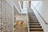 Modern home with Staircase, Glass Railing, and Wood Tread. stair to rooftop garden Photo of San Francisco Apartment
