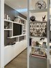 Modern home with Office, Storage, Study Room Type, Light Hardwood Floor, Bookcase, and Shelves. master bed looking toward office Photo 10 of San Francisco Apartment