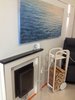 Modern home with Storage, Sofa, Table, Wood Burning Fireplace, and Living Room. fleimio trolley by the fireplace by the sauna. Photo 2 of Home Metsätähti