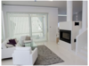 Modern home with Storage, Living Room, and Wood Burning Fireplace. fleimio trolley besides the fireplace in the living room. Photo 3 of Home Metsätähti