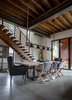 Modern home with Dining Room, Chair, Table, Ceiling Lighting, Accent Lighting, and Concrete Floor. Dining Room with Custom Stair Photo 12 of HoF