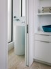 Modern home with Bath Room, Light Hardwood Floor, Vessel Sink, Pedestal Sink, Enclosed Shower, Ceramic Tile Wall, and Ceiling Lighting. Powder Bath Photo 17 of Butterfly House