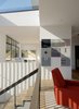 Modern home with Living Room, Light Hardwood Floor, Chair, Ceiling Lighting, and Wall Lighting. Main Level Across to Study Photo 10 of Dolores Heights Residence I