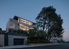 Modern home with Exterior, Flat RoofLine, House Building Type, Concrete Siding Material, Wood Siding Material, Metal Roof Material, Glass Siding Material, and Metal Siding Material. Exterior at Dusk Photo 3 of Dolores Heights Residence I