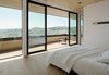Modern home with Chair and Light Hardwood Floor. Master Bedroom to View Photo 20 of Dolores Heights Residence I