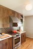 Modern home with Kitchen. A Jasper Morrison Glo-Ball adds soft light and plays up the surfaces of the semi-reflective tile.
For more info, go to: https://www.howellsarc.com/projects/holly-magda/ Photo 4 of Holly + Magda