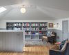 Modern home with Office, Library, Study, Chair, Bookcase, Storage, Shelves, Lamps, and Light Hardwood Floor. A built-in bookshelf is recessed to maximize every inch of space. Photo 3 of Writer's Garret
