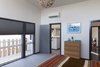 Modern home with Bedroom. Master Suite: the budget was tight, but we managed to work in luxe touches, like pure New Zealand wool carpeting at the upstairs. Photo 2 of Dan + Jenni