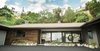 Modern home with Outdoor, Trees, Shrubs, Raised Planters, Front Yard, Boulders, Hardscapes, Walkways, Small Patio, Porch, Deck, Wood Patio, Porch, Deck, Stone Patio, Porch, Deck, and Horizontal Fences, Wall. Diablo Ranch was a neglected, dilapidated 1950s house with faded pink stucco and major water intrusion. Now it's a fully remodeled modern farmhouse, with reclaimed fence wood as siding. Photo 2 of Diablo Ranch