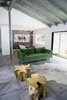 Modern home with Living Room, Sofa, Ottomans, Ceiling Lighting, Track Lighting, Pendant Lighting, and Porcelain Tile Floor. This room was water damaged and moldy from years of neglect. After dry rot and mold removal, the wall that separated the living and dining rooms was also removed. That allowed the overscale parquet pattern of the faux wood tile floors to continue in one uninterrupted expanse. Photo 7 of Diablo Ranch