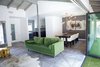 Modern home with Dining Room. Green, navy, gold, and gray are the foundational colors for this modern farmhouse, carried throughout the open floorplan. Photo 8 of Diablo Ranch
