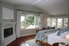 Modern home with Bedroom and Medium Hardwood Floor. Master Bedroom Photo 7 of de la Grulla