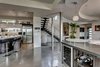Modern home with Trees, Side Yard, Shrubs, Grass, Front Yard, Flowers, Walkways, Large Patio, Porch, Deck, Stone Patio, Porch, Deck, Landscape Lighting, Sectional, Ceiling Lighting, Concrete Floor, Refrigerator, Gas Burning Fireplace, Microwave, Dishwasher, Range, Range Hood, and Living Room. Great room perfectly blends the kitchen, dinning room, family room and outdoor spaces into a spacious living area for the way we live today!
See more: www.DowntownKirklandModern.com Photo 5 of Downtown Kirkland Modern