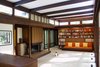Modern home with Living Room, Chair, Bench, Sofa, Bookcase, Coffee Tables, Recessed Lighting, Carpet Floor, and Standard Layout Fireplace. Living room Photo 10 of Kalamazoo Post and Beam Restoration
