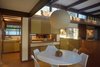 Modern home with Dining Room, Chair, Table, Lamps, Pendant Lighting, Recessed Lighting, and Cork Floor. Dining/kitchen Photo 11 of Kalamazoo Post and Beam Restoration