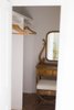 Modern home with Storage Room and Closet Storage Type. walk-in closet in master bedroom with heirloom vanity and bench Photo 17 of PILGRIM HOUSE