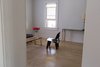 Modern home with Living Room, Light Hardwood Floor, and Bench. living room Photo 3 of PILGRIM HOUSE