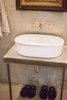 Modern home with Bath Room, Concrete Counter, Concrete Floor, Vessel Sink, and Concrete Wall. custom vanity Photo 6 of PILGRIM HOUSE