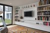 Modern home with Bookcase, Storage, and Shelves. Library / exercise room Photo 13 of House in the Woods