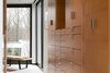 Modern home with Storage Room. Custom cabinetry, open walk-in Photo 19 of House in the Woods